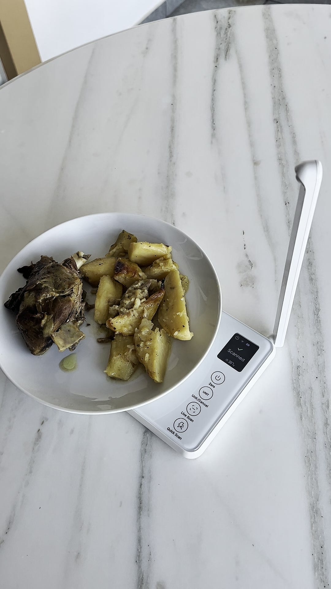 Customer photo of a roast dinner beside a white scale