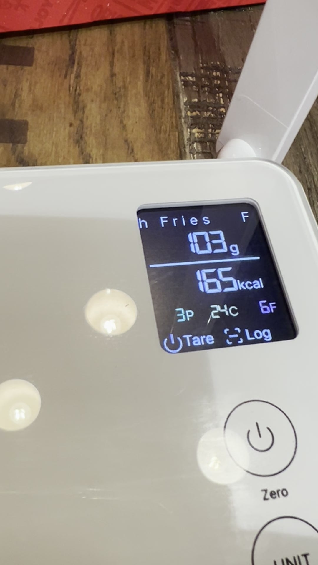 Customer photo of fries with macros on the scale display