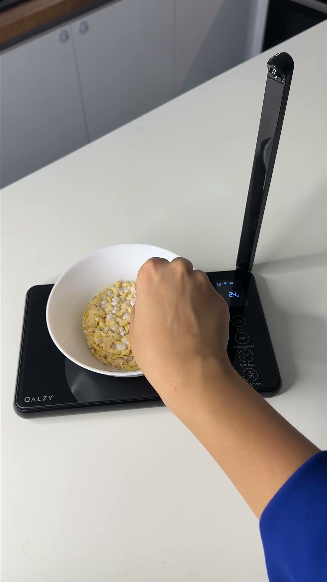 Customer photo of pasta poured into a bowl on a black scale
